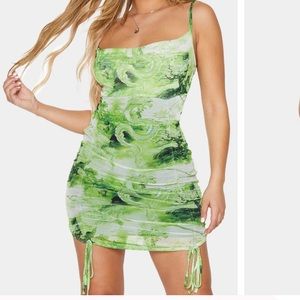 Lime Dragon Print Strappy Ruched Tie Hem
Bodycon Dress from PrettyLittleThing